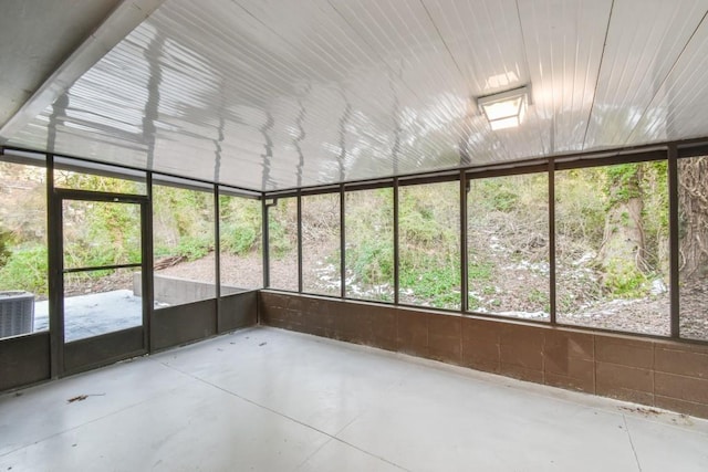 unfurnished sunroom featuring a healthy amount of sunlight