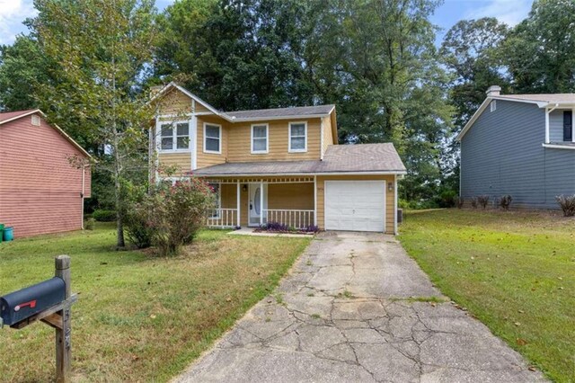 view of front of house with a front lawn and covered porch