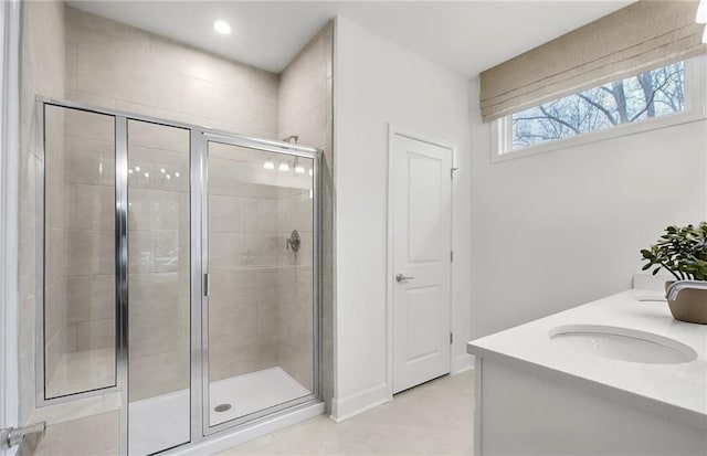 108 NW Jane Blvd, Cartersville, GA 30120 - full bath with a shower stall, tile patterned flooring, double vanity, and baseboards