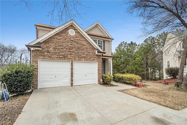 view of front of property with concrete driveway, an attached garage, and stone siding