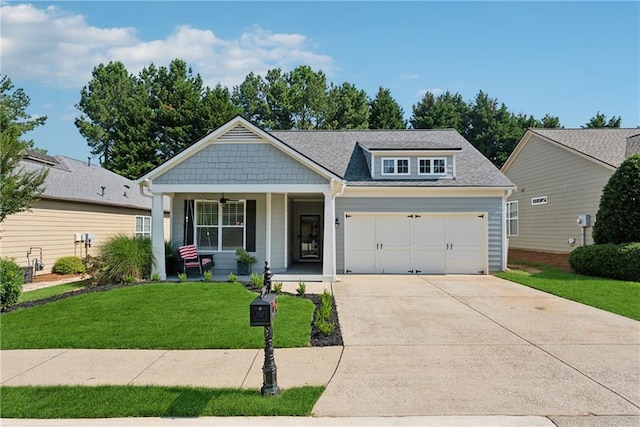 507 Bonneset Ct, Canton, GA 30114 - view of front of property with covered porch, a front yard, driveway, a garage, and roof with shingles