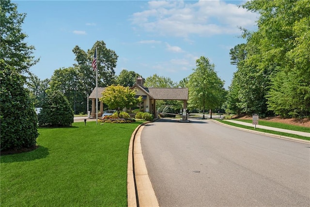 507 Bonneset Ct, Canton, GA 30114 - view of asphalt road with curbs and sidewalks