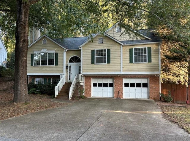 raised ranch featuring a garage