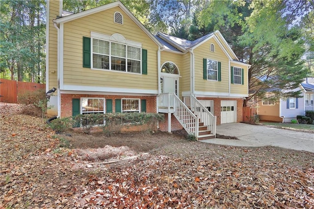 bi-level home featuring a garage