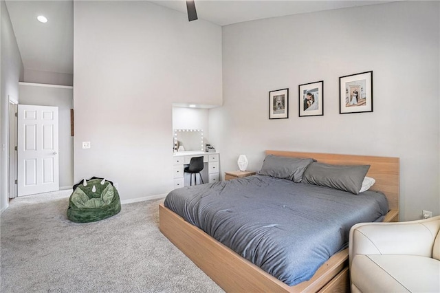 carpeted bedroom featuring baseboards