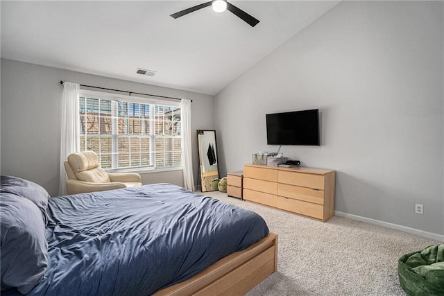 bedroom with baseboards, visible vents, ceiling fan, vaulted ceiling, and carpet flooring