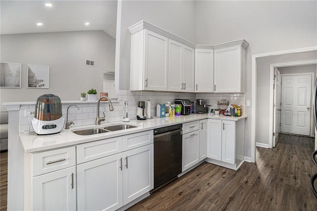 kitchen featuring visible vents, a sink, black dishwasher, white cabinetry, and light countertops