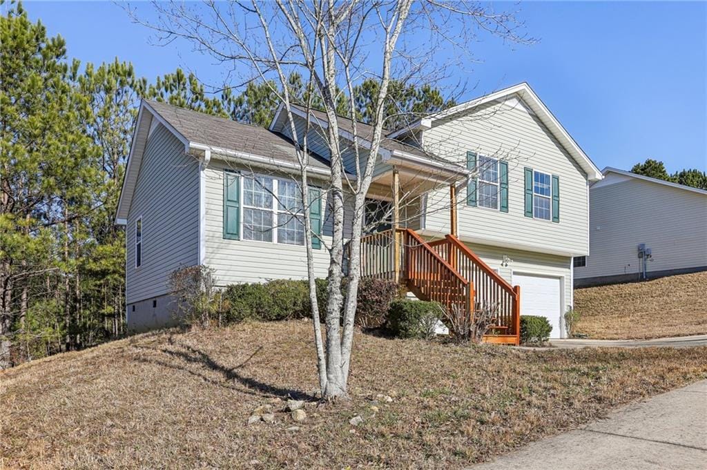 view of front of home featuring a garage