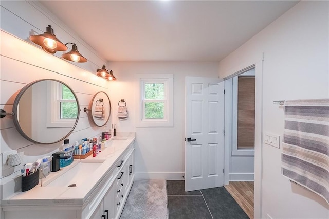110 W Putnam Ferry Rd, Woodstock, GA 30189 - bathroom with double vanity and baseboards
