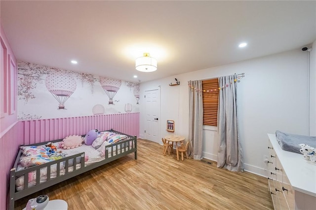110 W Putnam Ferry Rd, Woodstock, GA 30189 - bedroom with light wood-type flooring and recessed lighting