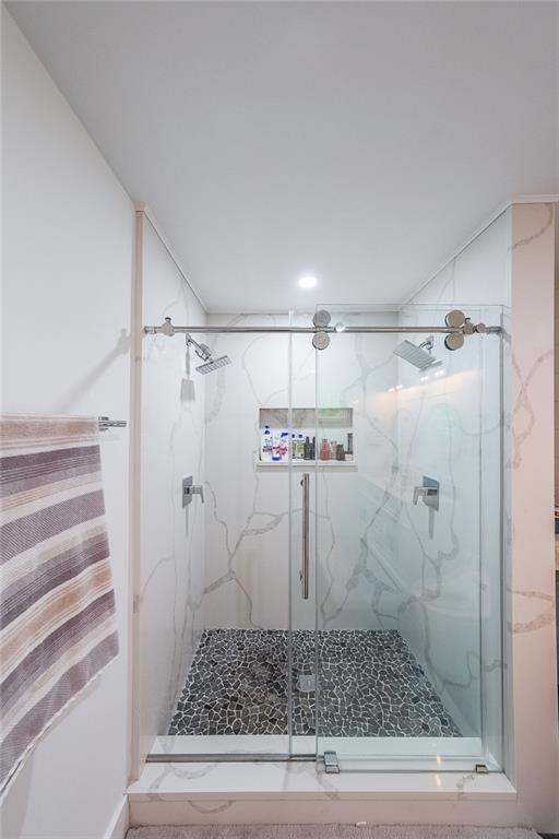 110 W Putnam Ferry Rd, Woodstock, GA 30189 - full bathroom featuring a marble finish shower and recessed lighting