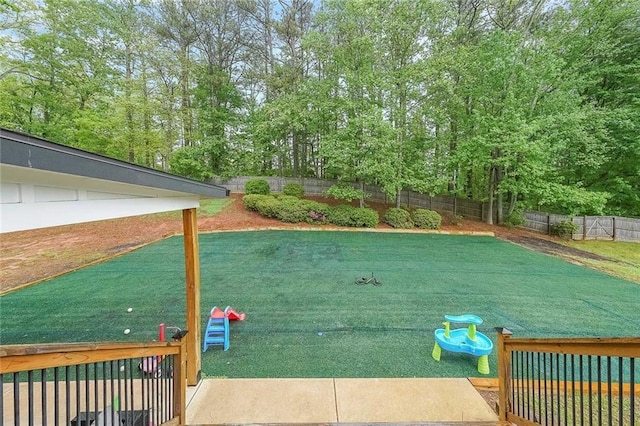 110 W Putnam Ferry Rd, Woodstock, GA 30189 - fenced backyard with view of wooded area