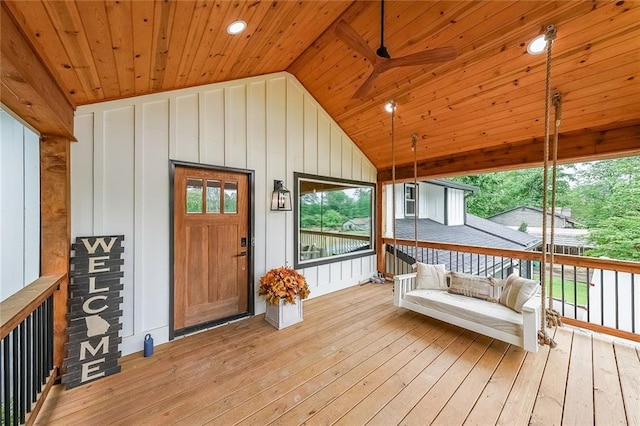 110 W Putnam Ferry Rd, Woodstock, GA 30189 - doorway to property featuring board and batten siding, a deck, and a shingled roof