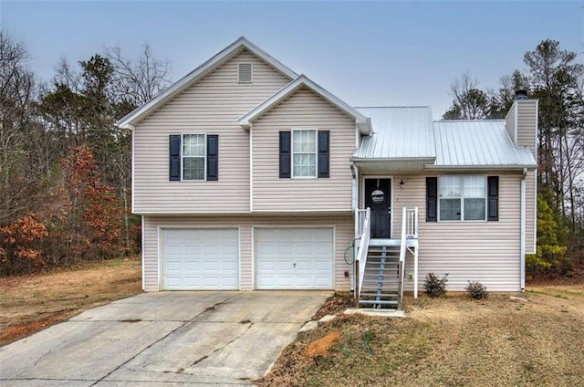 split level home featuring a garage