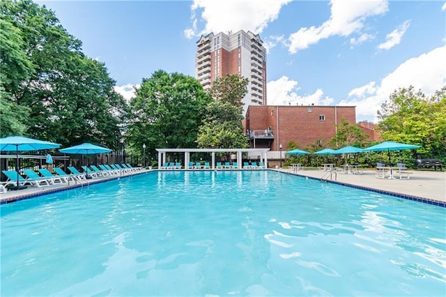 pool with a patio