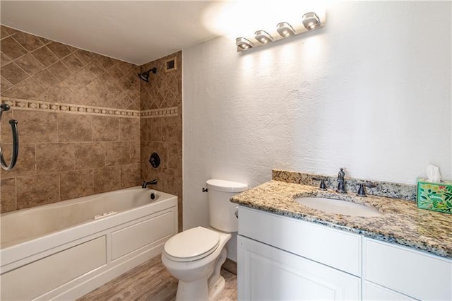375 Ralph Mcgill Blvd NE Unit 807, Atlanta, GA 30312 - bathroom featuring vanity, shower / bathing tub combination, toilet, and wood finished floors