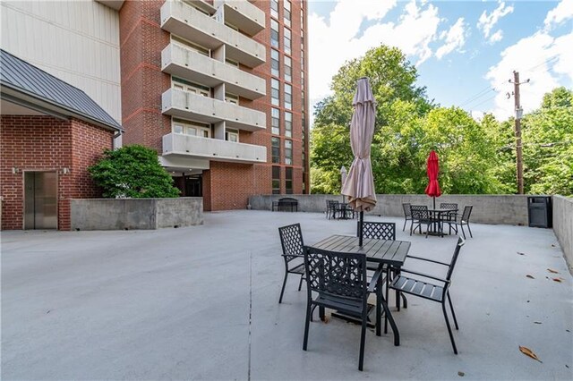 375 Ralph Mcgill Blvd NE Unit 807, Atlanta, GA 30312 - view of patio with outdoor dining space
