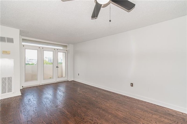 375 Ralph Mcgill Blvd NE Unit 807, Atlanta, GA 30312 - empty room featuring visible vents, a textured ceiling, dark wood-style flooring, and a ceiling fan