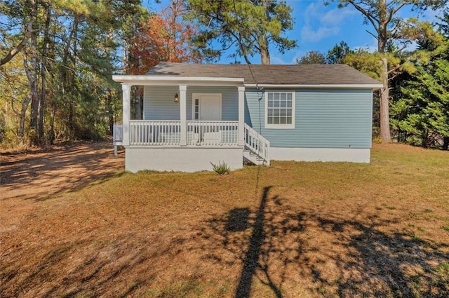 bungalow-style home with a porch and a front yard