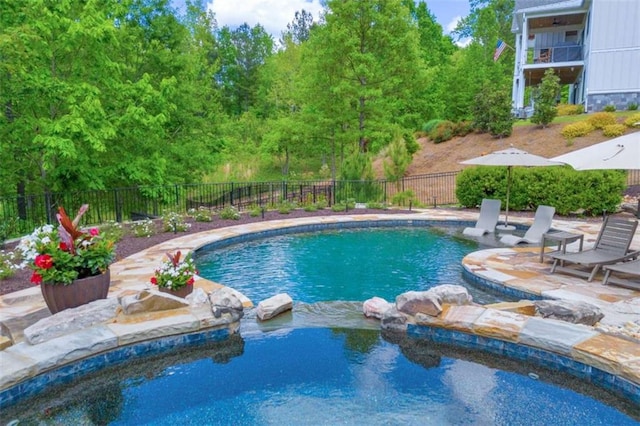 view of pool featuring a patio