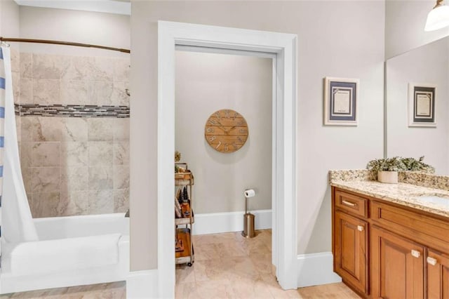 bathroom with vanity and shower / bath combo with shower curtain