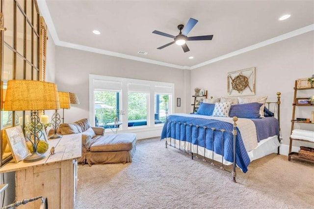 bedroom featuring carpet, ceiling fan, and ornamental molding