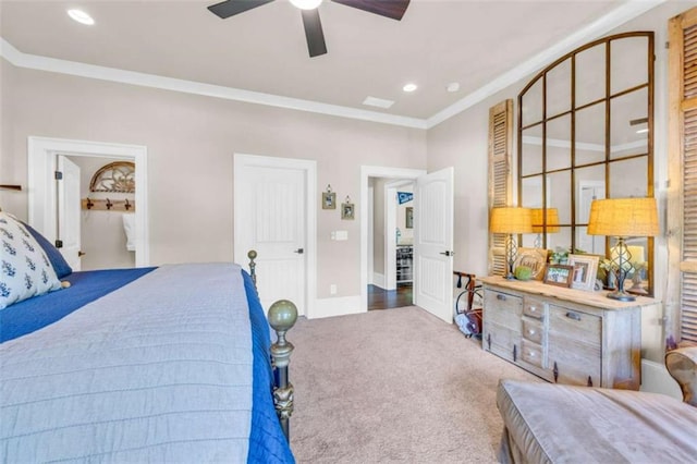 carpeted bedroom with ceiling fan and ornamental molding