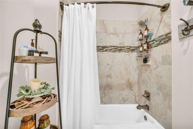 bathroom featuring shower / bathtub combination with curtain