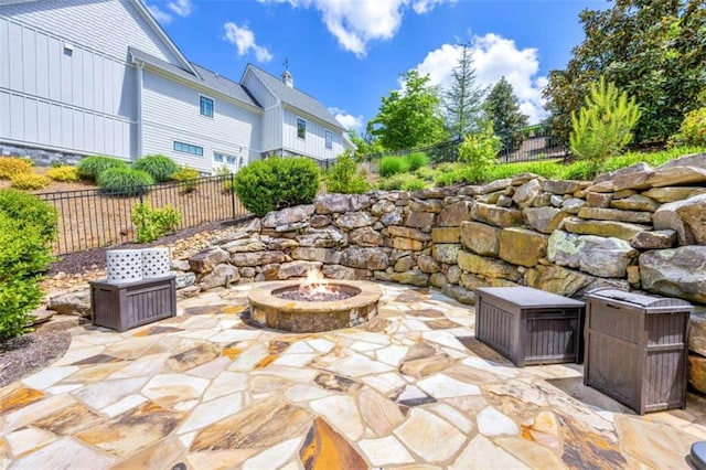 view of patio with an outdoor fire pit