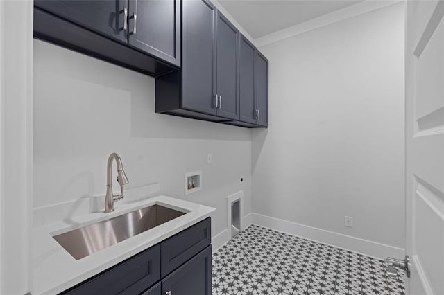 laundry room with hookup for a washing machine, cabinet space, a sink, electric dryer hookup, and baseboards