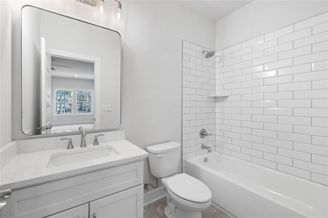 full bath featuring bathtub / shower combination, baseboards, vanity, and toilet