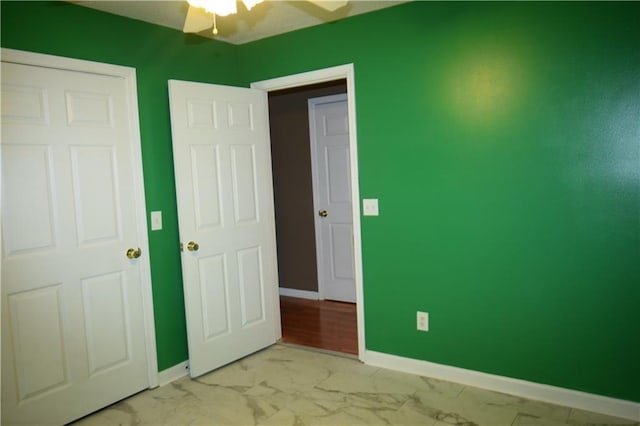 unfurnished bedroom with ceiling fan