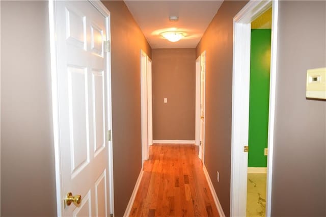 corridor featuring light wood-type flooring