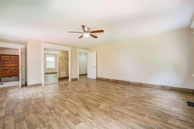 interior space with light hardwood / wood-style floors and ceiling fan