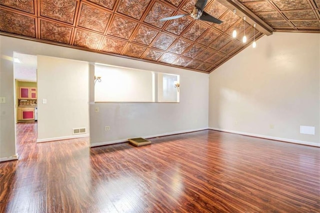 unfurnished room featuring ceiling fan, dark hardwood / wood-style flooring, and lofted ceiling