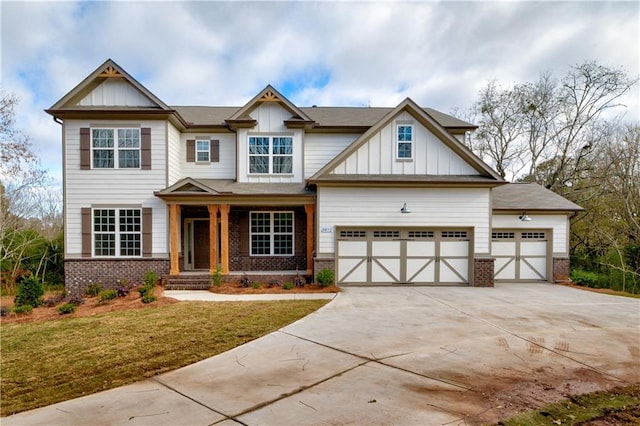 craftsman house featuring a porch, a garage, and a front yard