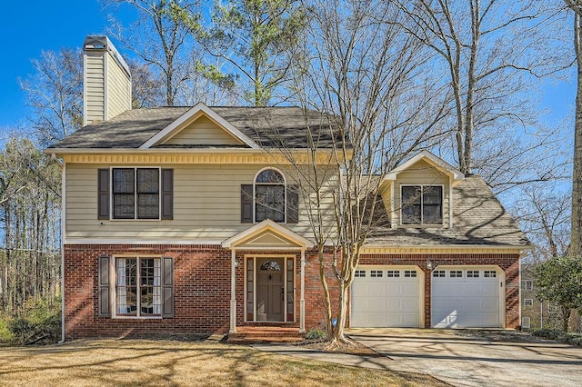 view of front of home featuring a garage, concrete driveway, brick siding, and a chimney