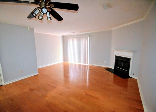 775 Heritage Valley Rd, Norcross, GA 30093 - unfurnished living room with a ceiling fan, ornamental molding, a fireplace with flush hearth, wood finished floors, and baseboards