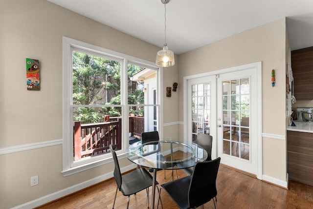 12350 Broadleaf Ln, Johns Creek, GA 30005 - dining area with french doors, wood finished floors, and baseboards
