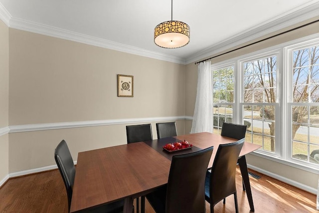 12350 Broadleaf Ln, Johns Creek, GA 30005 - dining space featuring baseboards, wood finished floors, and crown molding