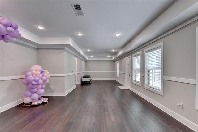 workout area with dark hardwood / wood-style flooring