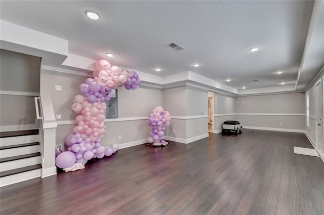 playroom with dark hardwood / wood-style floors