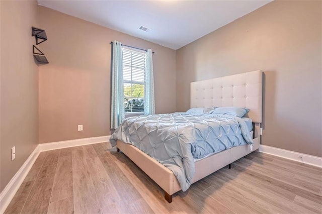 bedroom featuring light hardwood / wood-style flooring