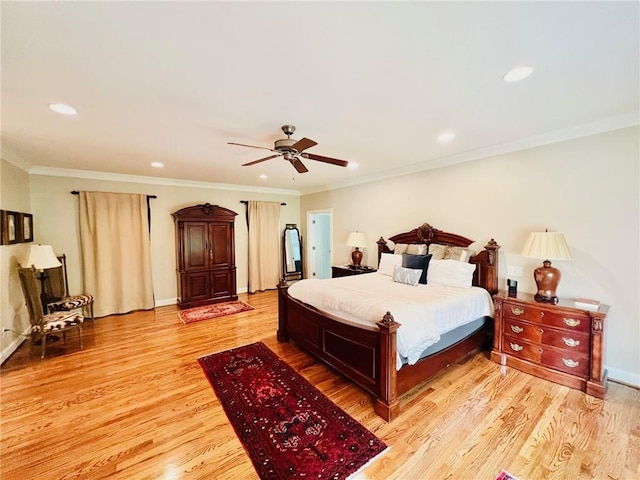 bedroom with light wood-type flooring, ornamental molding, and ceiling fan