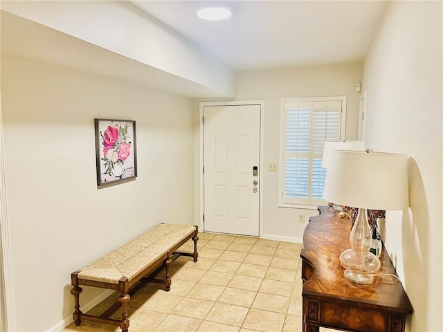 foyer with light tile patterned floors