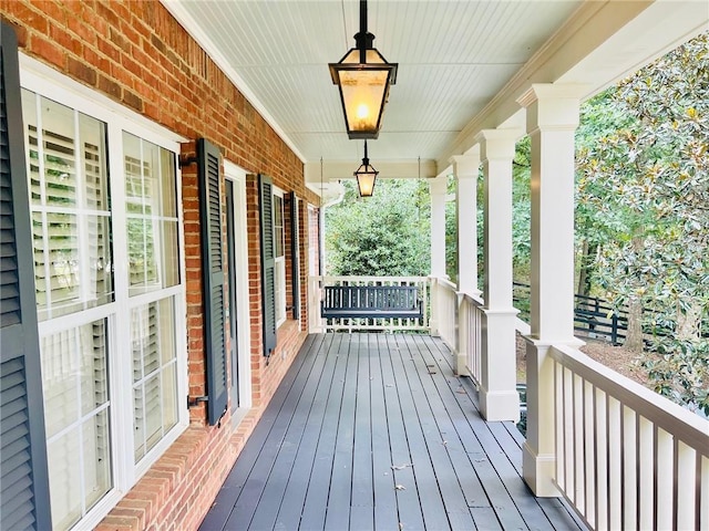 deck featuring covered porch