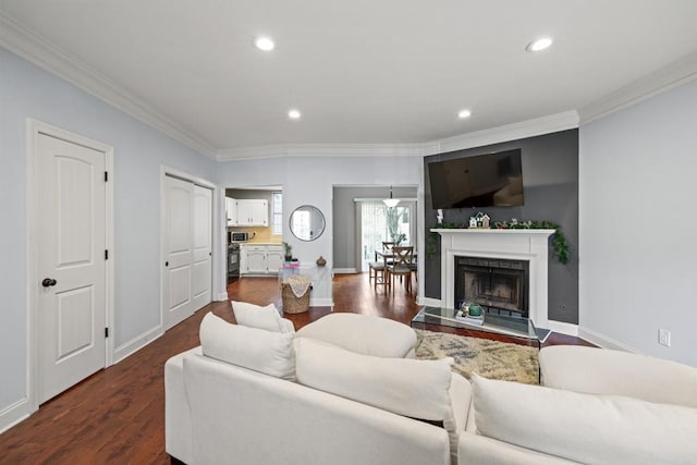 living room featuring crown molding and dark hardwood / wood-style flooring