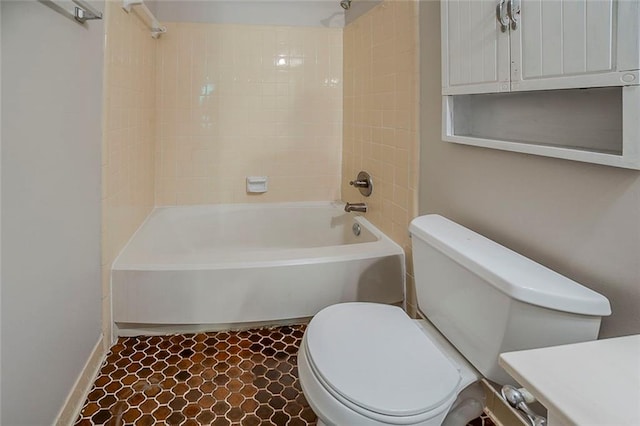 bathroom with toilet and shower / bath combination
