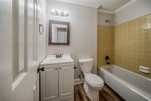 full bath featuring wood finished floors, vanity, toilet, shower / bathtub combination, and ornamental molding