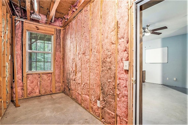 interior space featuring ceiling fan